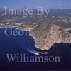 GW24646-50 = Aerial view of Cap Andritxol ( with lookout tower - Atalaya - restored by Claudia Schiffer - and tourist boats ) towards Camp de Mar, Andratx, SW Mallorca, Balearic Islands, Spain.